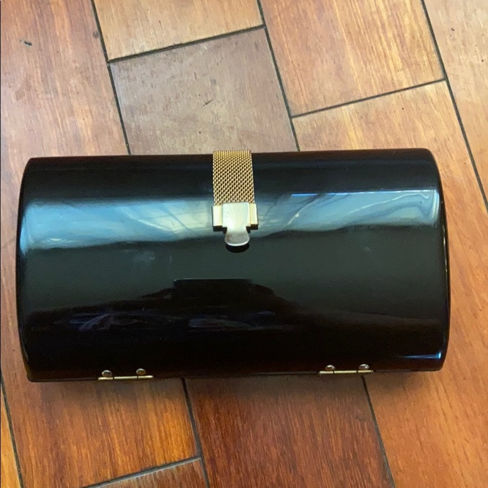 Black clutch sold